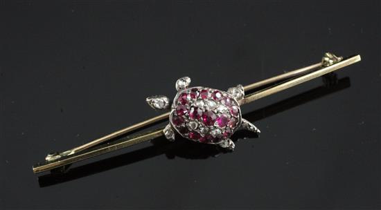 A late Victorian gold and silver, ruby and rose cut diamond set turtle bar brooch, 2.25in.